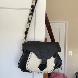 Leather and cow hide Saddle bag